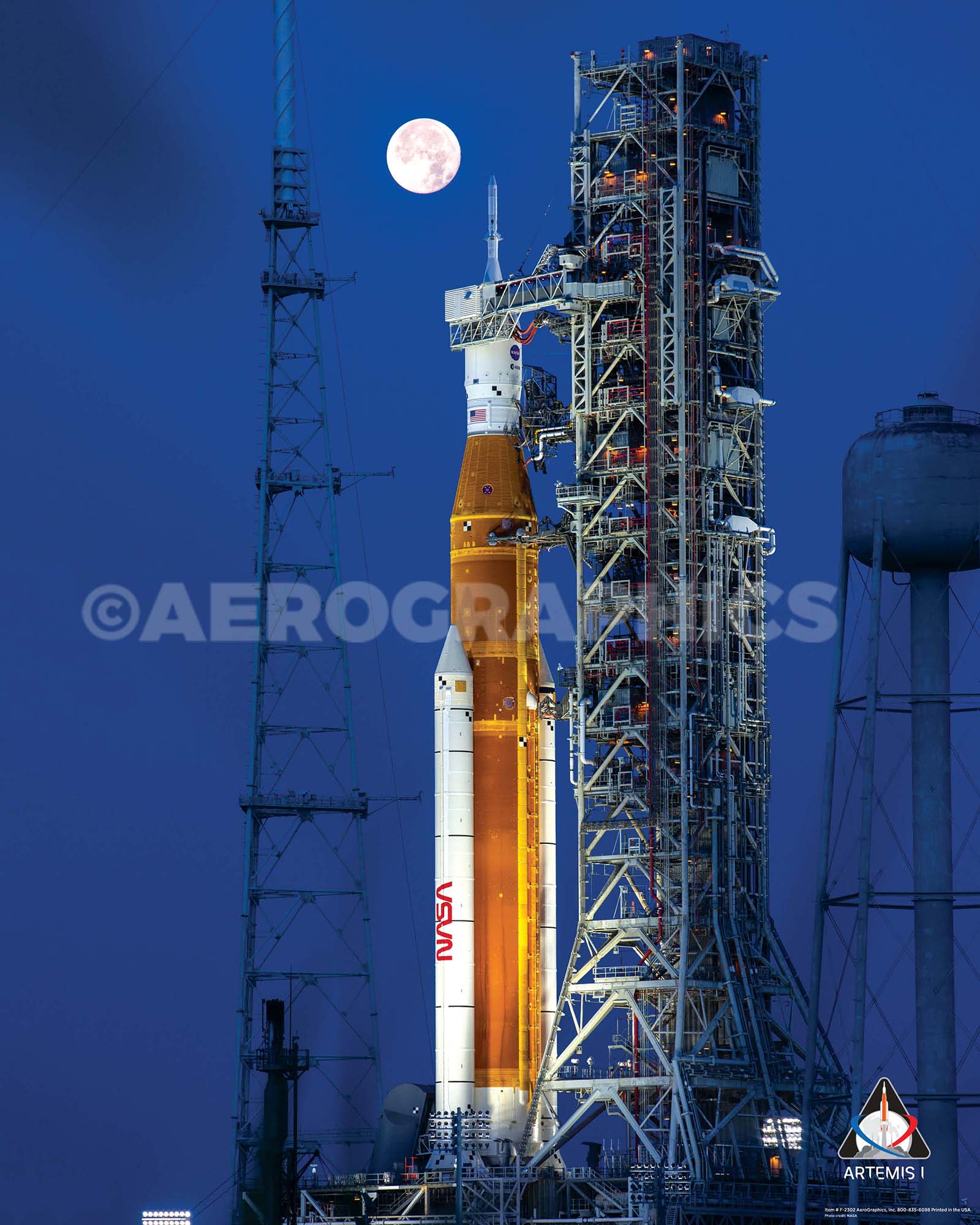 Artemis 1 on pad with moon